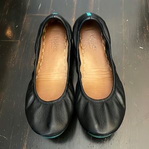 Black leather tieks flats